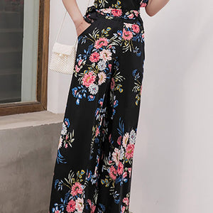 Floral Spaghetti Strap Wide Leg Jumpsuit with Pockets Trendsi