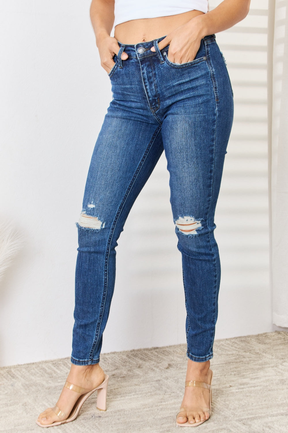 Judy Blue Full Size Mid Waist Distressed Slim Jeans Trendsi