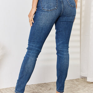 Judy Blue Full Size Mid Waist Distressed Slim Jeans Trendsi