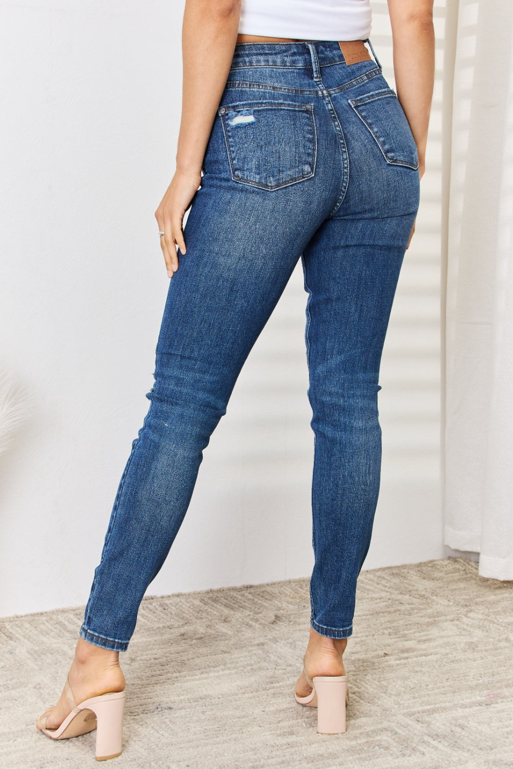 Judy Blue Full Size Mid Waist Distressed Slim Jeans Trendsi